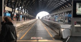 Train station in Milan, Italy showing departing trains